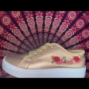 Rose gold sneakers with embroidered roses